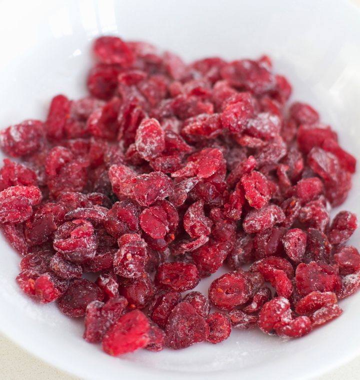 Dried cranberries in a white bowl