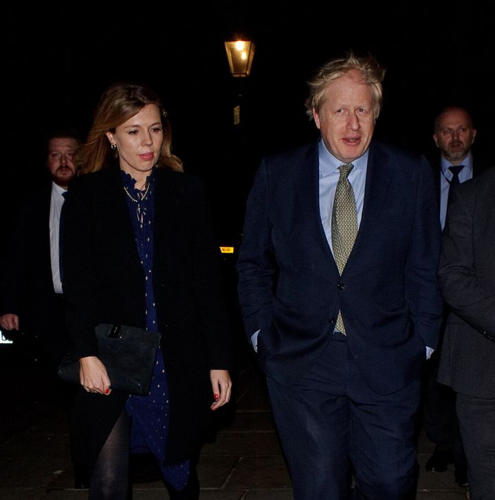 Boris Johnson and his now wife, Carrie, seen attending Evgeny Lebedev's Christmas Party on December 13, 2019 - the day after his election victory.