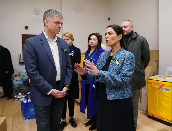 Home Secretary Priti Patel with Ukraine's ambassador to the UK, Vadym Prystaiko, during her visit to the Ukrainian Social Club in Holland Park, London. 