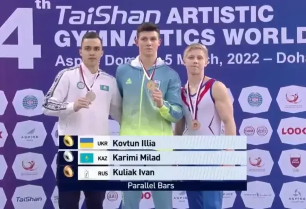 Russia's Ivan Kuliak stands side by side with Ukraine's Kovtun