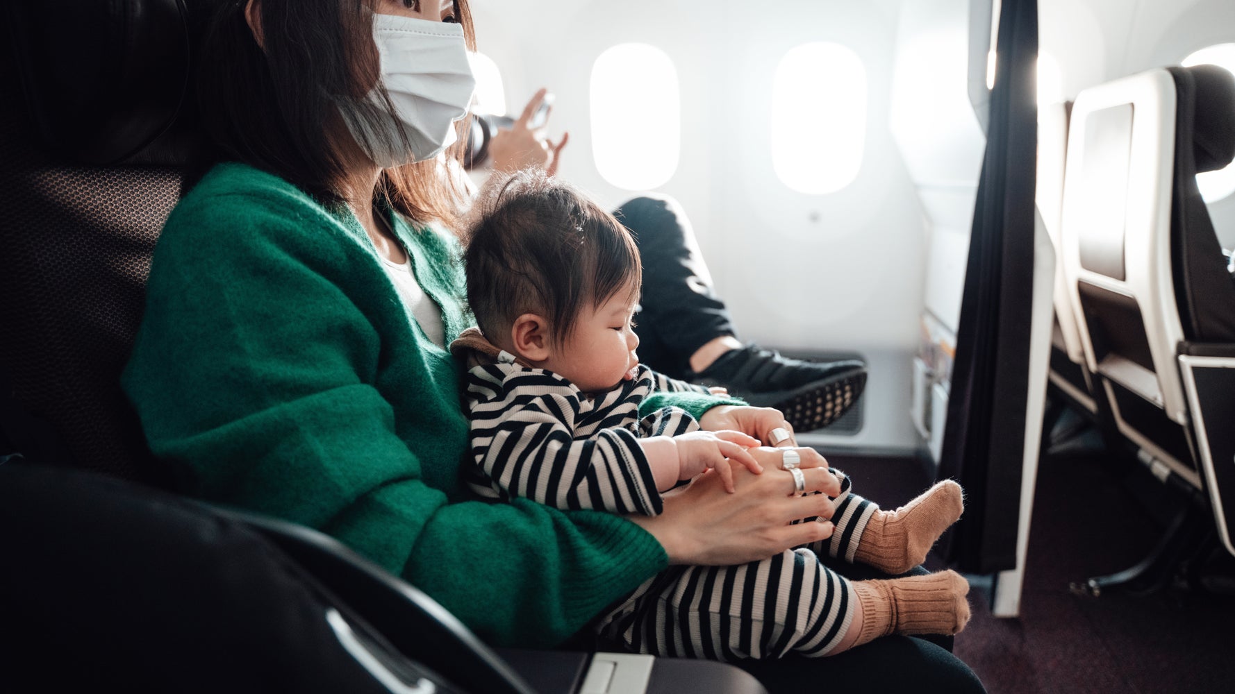 Flying With A Baby Travel Essentials and Flying With A Toddler Travel Tips  - Fun with Mama