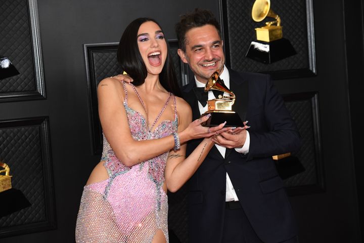Dua Lipa celebrating her Grammys win with her former manager Ben Mawson last year