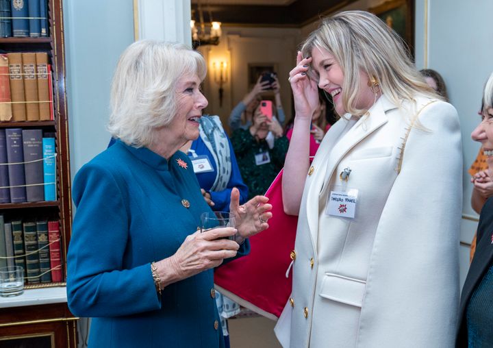 Camilla, the Duchess of Cornwall meets Emerald Fennell at an International Women's Day event