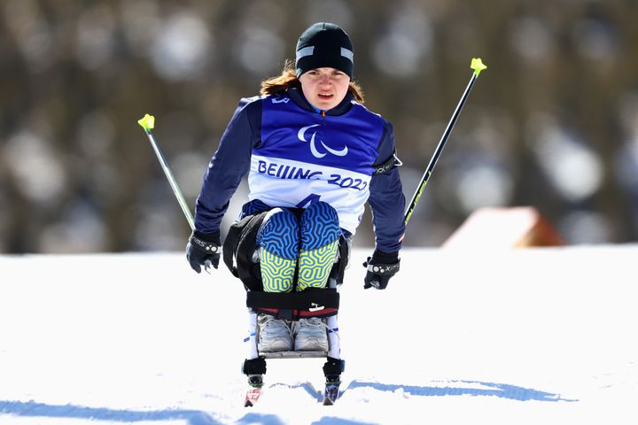 Anastasiia Laletina of Ukraine competes in the women's sprint sitting Paralympic para biathlon on the first day of the Beijing 2022 Winter Paralympics.