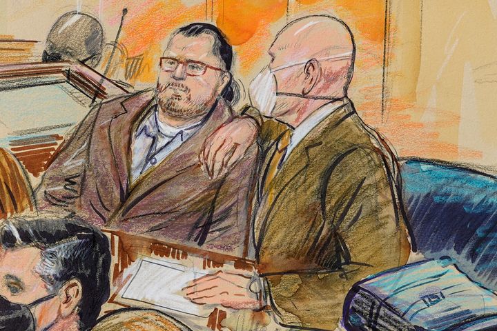 This artist sketch depicts Guy Wesley Reffitt, joined by his lawyer William Welch, right, in Washington, D.C., on Feb. 28.