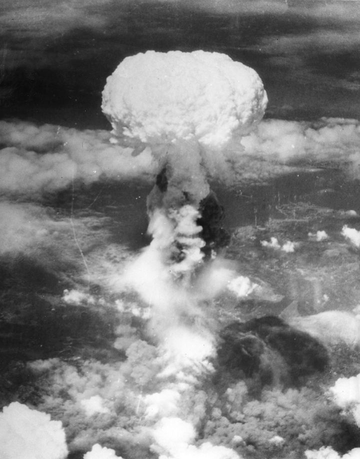 In this Aug. 9, 1945, file photo, a giant column of smoke rises more than 60,000 feet into the air, after the second atomic bomb ever used in warfare explodes over the Japanese port town of Nagasaki.