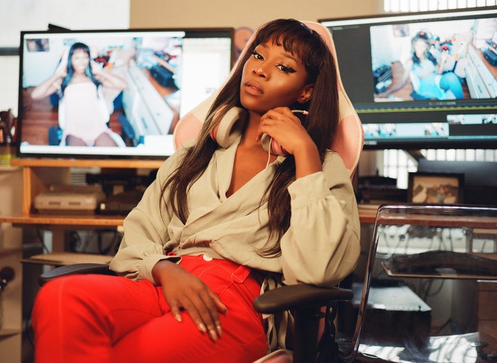 "After months of this journey, I’m now at peace with my diagnosis," writes Vanniall, photographed in front of her video editing workstation.