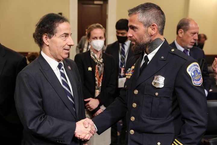 Rep. Jamie Raskin, (D-Md.), shakes hands with Metropolitan Police officer Michael Fanone following testimony before the House Jan. 6 select committee.