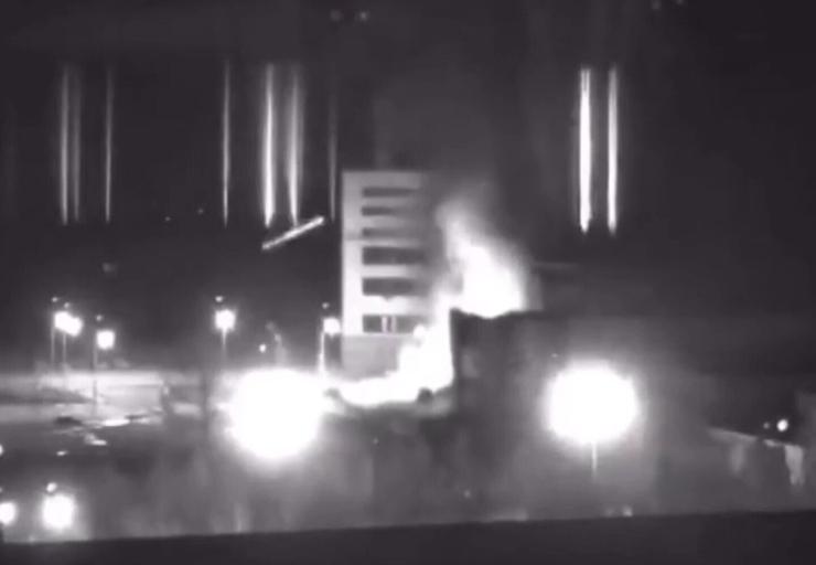 A screen grab captured from a video shows a view of Zaporizhzhya nuclear power plant during a fire following clashes around the site in Ukraine on March 4, 2022.