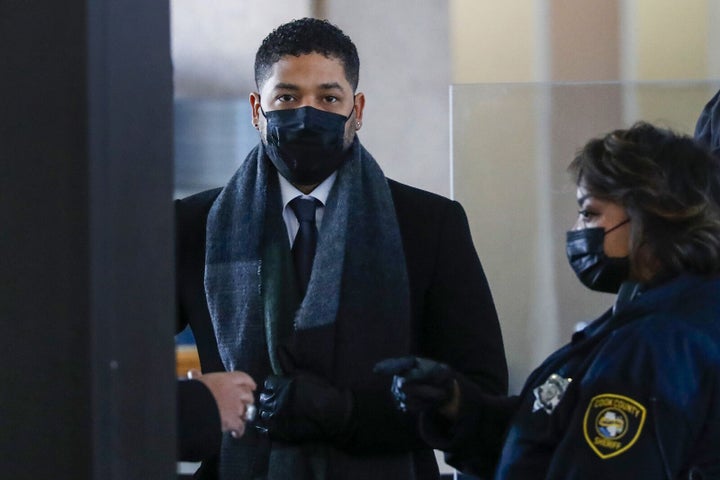 Actor Jussie Smollett arrives with his family to the Leighton Criminal Courthouse in Chicago, Illinois on Dec. 7, 2021.