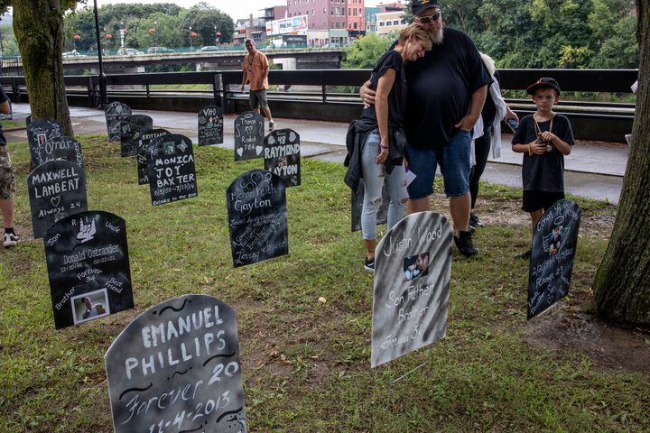 Family members of people who have died from overdosing on opioids mark International Overdose Awareness Day on August 21, 2021 in Binghamton, New York. 