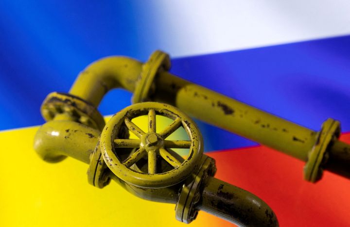  3D printed Natural Gas Pipes are placed on displayed Russia's and Ukraine's flags in this illustration taken, January 31, 2022. REUTERS/Dado Ruvic/Illustration/File Photo