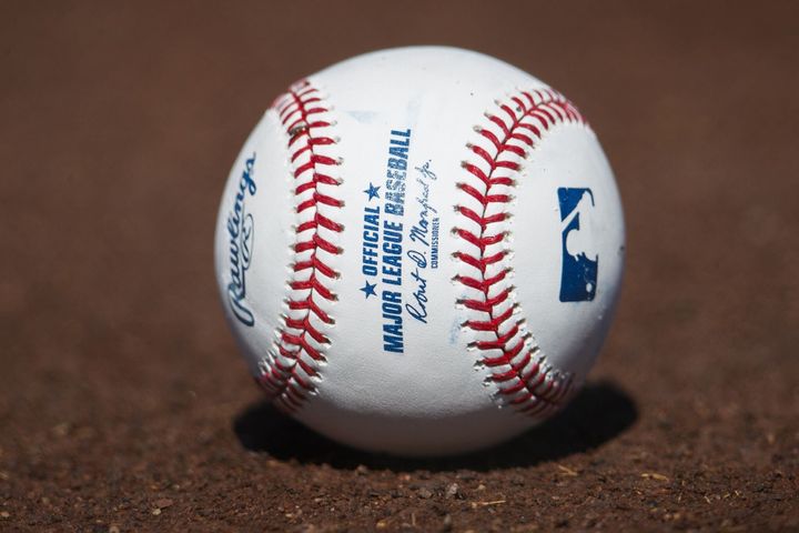 A baseball sits on a practice field on the first day of full-squad workouts during Cubs spring training on Feb. 22, 2021, at Sloan Park in Mesa, Ariz. (Armando L. Sanchez/Chicago Tribune/Tribune News Service via Getty Images)