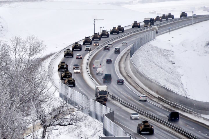 New satellite photos appeared to show a massive convoy outside the Ukrainian capital had fanned out into towns and forests near Kyiv