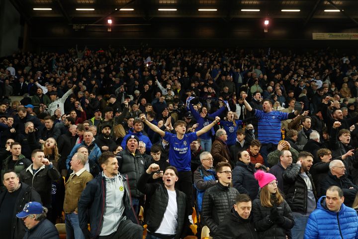 Chelsea fans celebrate after their sides victory during the Premier League match between Norwich City and Chelsea at Carrow Road on March 10 (Photo by Julian Finney/Getty Images)