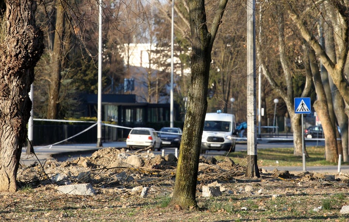 Photos from the scene show metal pieces of the wreckage spread on the ground and what seems to be a section of a wing.