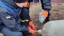 2 Ukrainians Calmly Defuse Unexploded Russian Bomb In Heart-Pounding Video 2 Ukrainians Calmly Defuse Unexploded Russian Bomb In Heart-Pounding Video