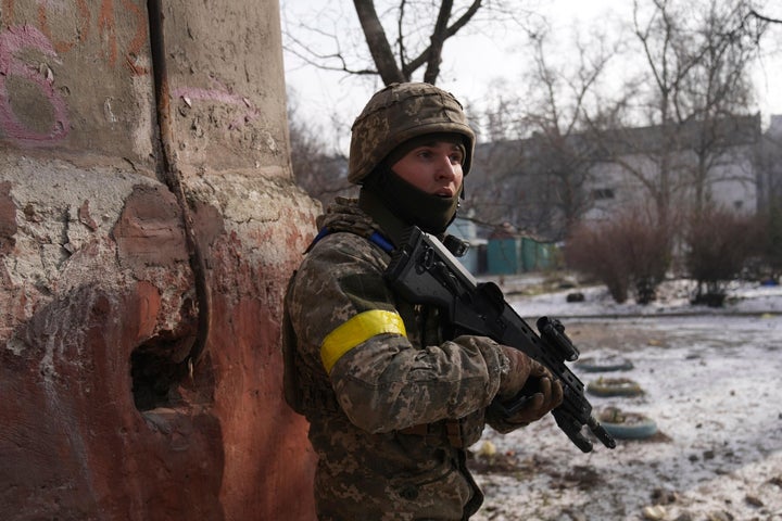 A Ukrainian serviceman guards his position in Mariupol, Ukraine, Saturday, March 12, 2022. (AP Photo/Evgeniy Maloletka)