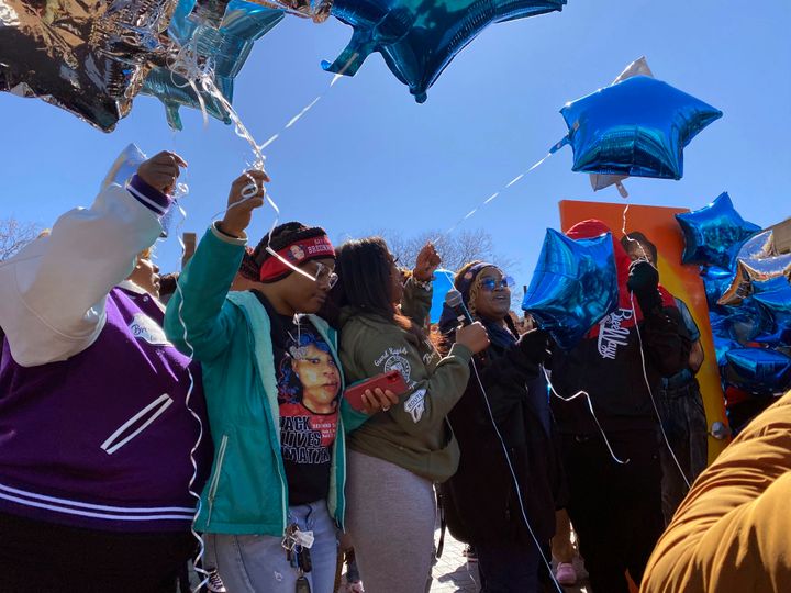 Demonstrators, joined by members of Breonna Taylor's family, gather to release balloons in Jefferson Square Park in Louisville, Ky., for a memorial on the two-year anniversary of Breonna Taylor's death, on March 13, 2022. 