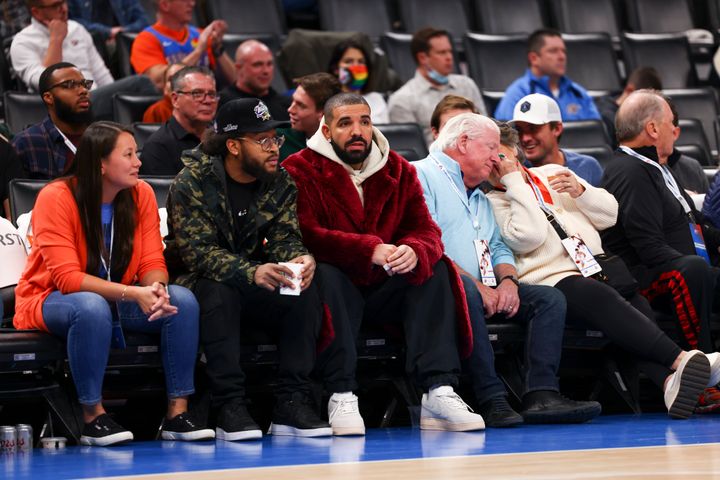 Drake watchs the Oklahoma City Thunder player the Houston Rockets in Oklahoma City in December 2021.
