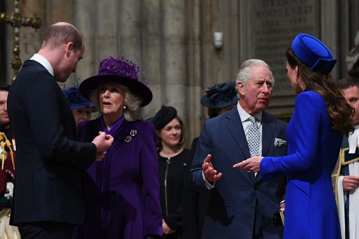 From left, Prince William, Camilla, Duchess of Cornwall, Prince Charles and Catherine, Duchess of Cambridge, speak at Westminster Abbey in London on Monday.