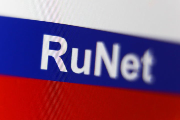 Russian flag and the word 'RuNet' displayed on a laptop screen are seen in this illustration photo taken in Krakow, Poland on March 9, 2022.