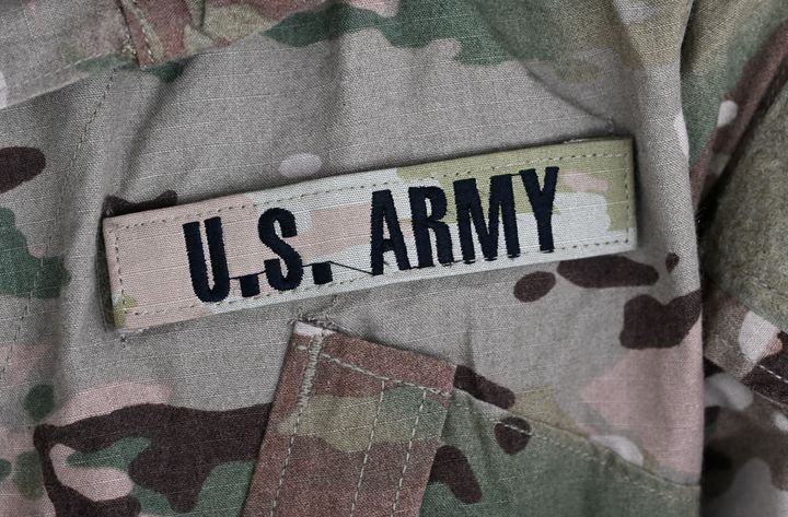 A U.S. army sign is pictured on a soldier's uniform at the United States Army military training base in Grafenwoehr, southern Germany, on March 11, 2022. 