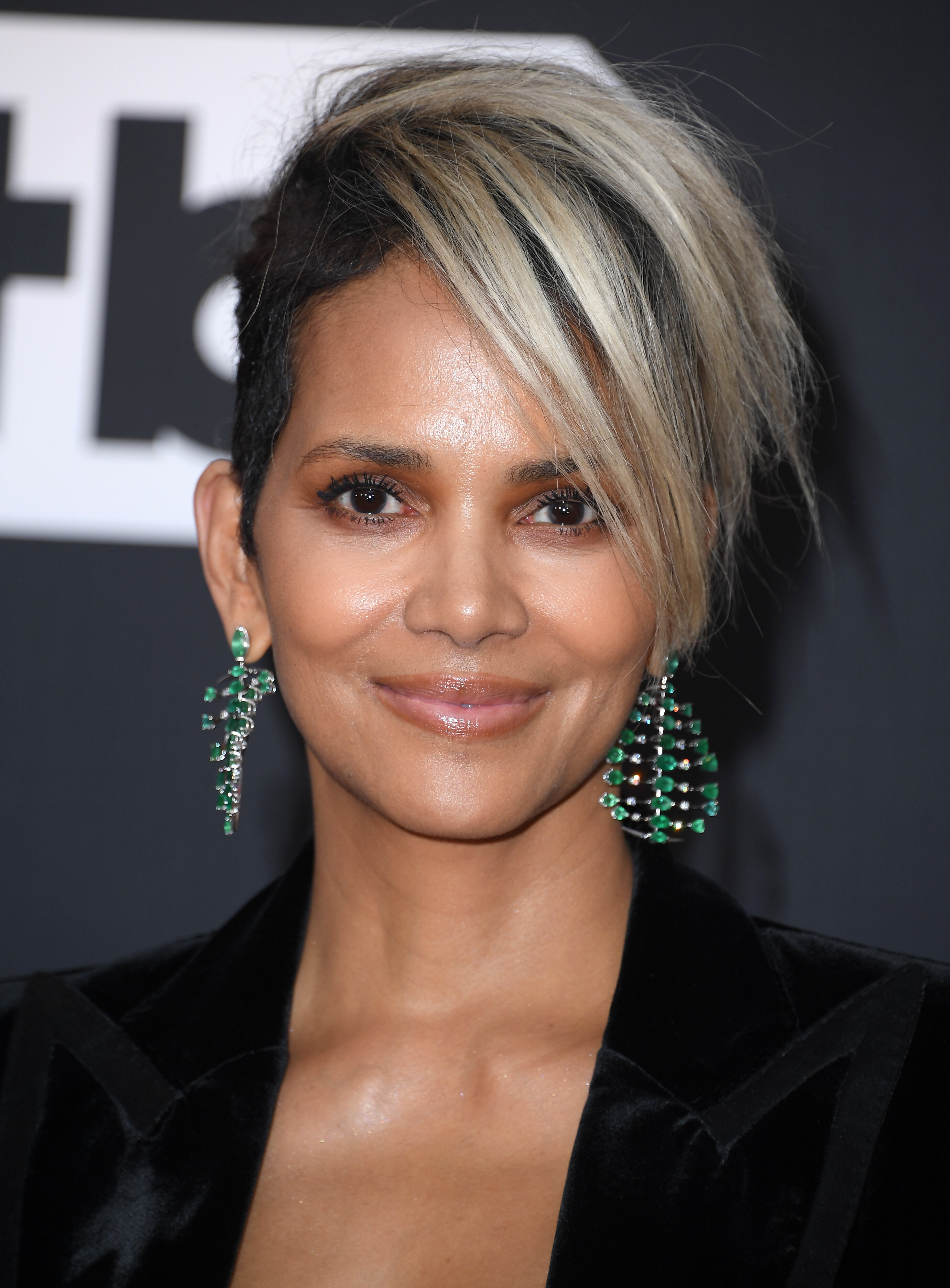Halle Berry sporting a long straight hairstyle with movement