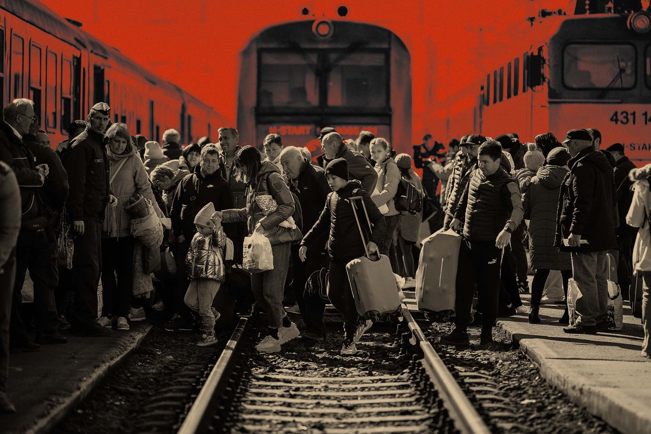 People queue to board a train back to Ukraine across the border from Hungary on March 12, 2022 in Zahony, Hungary. 