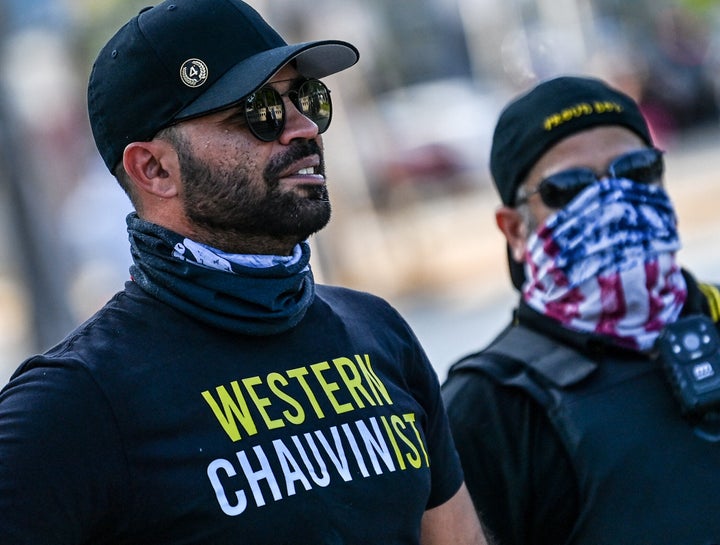 Enrique Tarrio wears a shirt supporting former police officer Derek Chauvin while people gathered in Miami to mark the anniversary of George Floyd's killing by Chauvin on May 25, 2021.