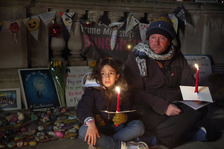 Richard Ratcliffe and daughter Gabriella hold a candlelit vigil outside the Foreign Office for Nazanin Zaghari-Ratcliffe