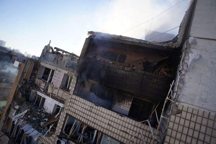 A view shows a residential building damaged by shelling, as Russia's attack on Ukraine continues, in Kyiv, Ukraine, in this handout picture released March 16, 2022. Press service of the State Emergency Service of Ukraine/Handout via REUTERS ATTENTION EDITORS - THIS IMAGE HAS BEEN SUPPLIED BY A THIRD PARTY.