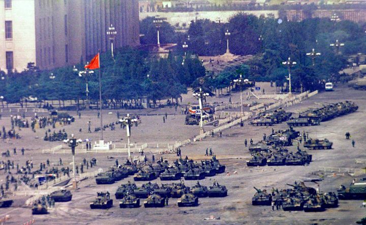 Chinese troops and tanks gather in Beijing, one day after the military crackdown that ended a seven week pro-democracy demonstration on Tiananmen Square in Beijing on June 5, 1989. 