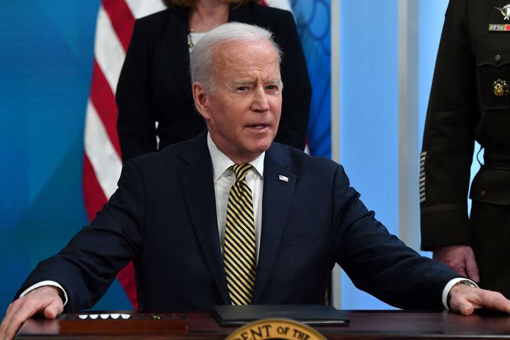 President Joe Biden participates in a signing ceremony after delivering remarks on U.S. assistance to Ukraine on Wednesday. 
