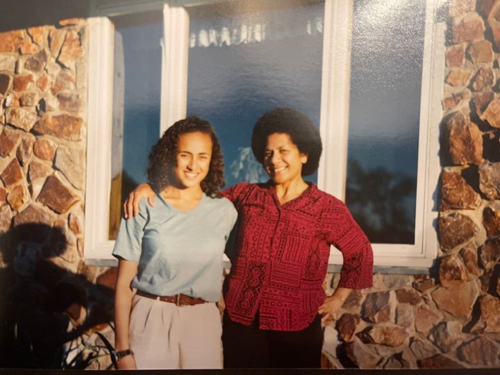 "Anything that drew attention to me seemed to warrant verbal racial abuse (such as a sports or academic award)," writes Eleanor Beaton (left), pictured with her mother.