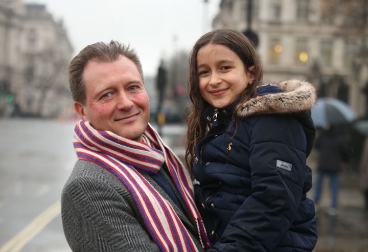 Richard Ratcliffe with his daughter Gabriella outside the houses of parliament after his wife Nazanin Zaghari-Ratcliffe was freed from detention by Iranian authorities.