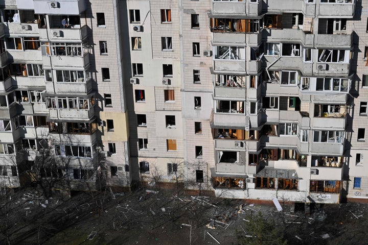 View of a damaged apartment building in Kyiv, Ukraine after it was hit by remnants of a downed Russian rocket on March 17, 2022.