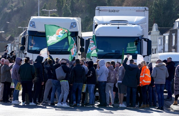 Former P&O staff and RMT members block the road leading to the Port of Dover after P&O Ferries handed 800 seafarers immediate severance notices.