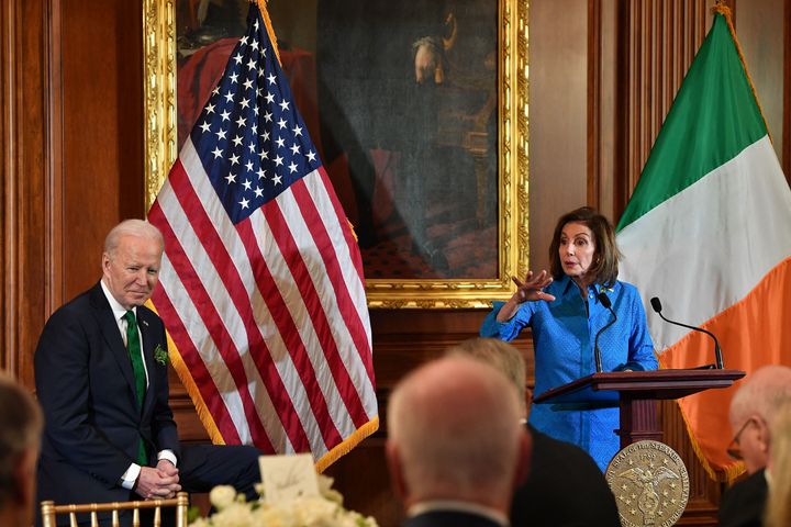 Nancy Pelosi speaks as Joe Biden listens during the annual St Patrick's Day luncheon on Capitol Hill.