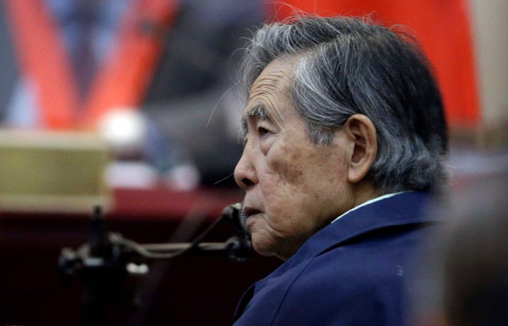 In this March 15, 2018 file photo, Peru's former President Alberto Fujimori listens to a question during his testimony in a courtroom at a military base in Callao, Peru.