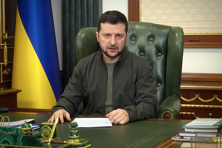 Putin speaks at a massive rally in Moscow 2 In this image taken from video provided by Ukraine's Presidential Press Office and posted to Facebook early March 18, 2022, Ukrainian President Volodymyr Zelenskyy speaks from Kyiv, Ukraine. (Ukrainian Presidential Press Office via AP)