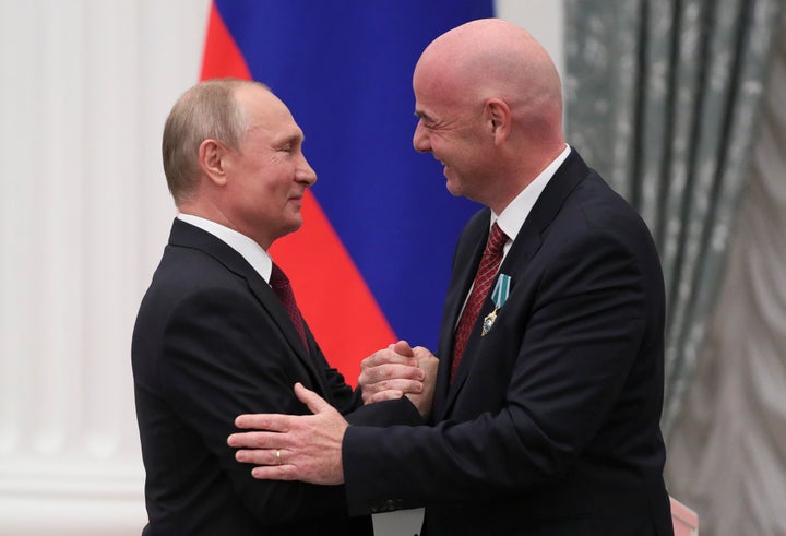 Russian President Vladimir Putin awards the "Order of Friendship" to FIFA President Gianni Infantino at the Kremlin in 2019.