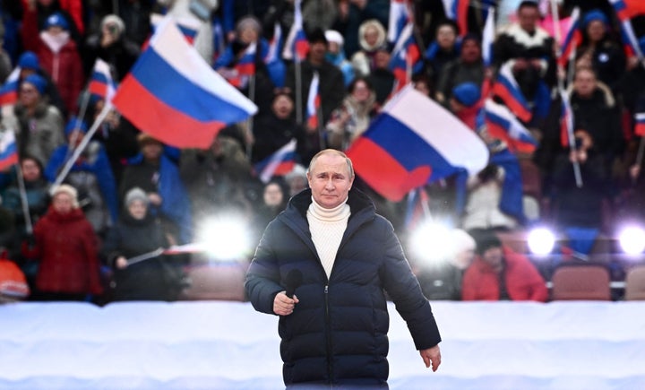 Russian president Vladimir Putin attends a concert marking the eighth anniversary of Russia's annexation of Crimea in Moscow, on Friday.