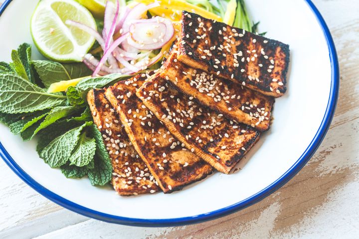 You can get your tofu nice and crispy if you press all the excess liquid out of it before cooking it.