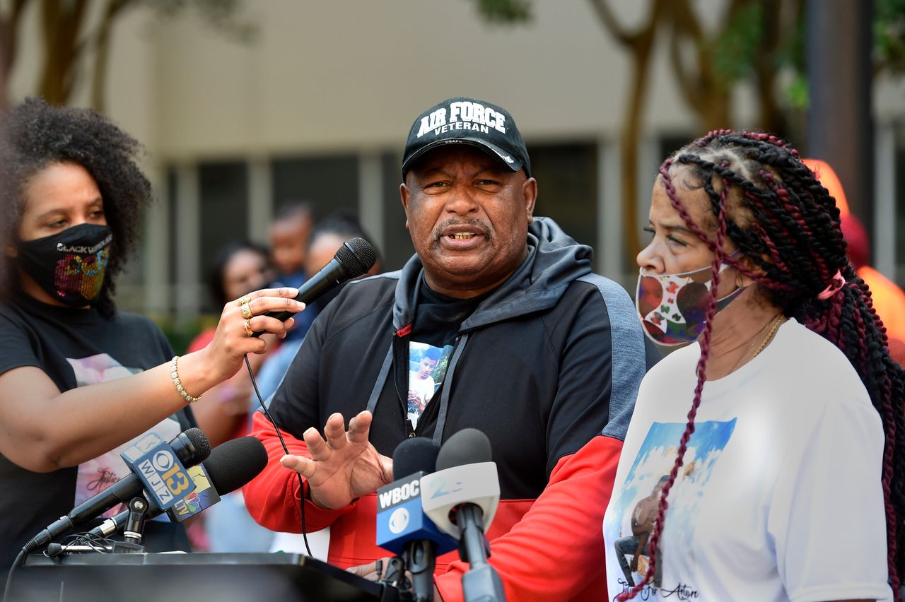 Anton Black's sister, father and mother speak during a press conference on Sept. 30, 2021, in Baltimore. Black, 19, died in 2018 during a struggle with officers who handcuffed him and shackled his legs.