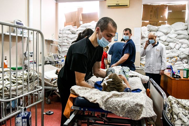 Injured civilians from Mariupol receive treatment in Zaporizhzhia on March 18.