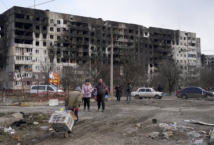 Civilians trapped in the city of Mariupol amid Russian attacks are evacuated in groups under the control of pro-Russian separatists on Sunday.