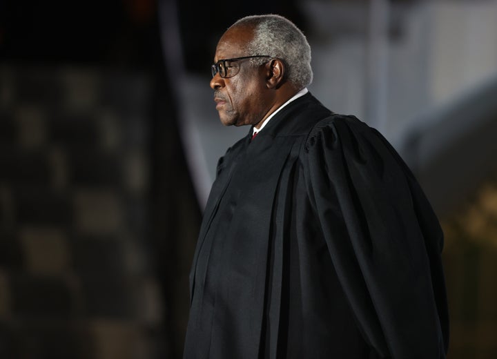 Supreme Court Associate Justice Clarence Thomas attends the ceremonial swearing-in ceremony for Amy Coney Barrett to be the U.S. Supreme Court Associate Justice on the South Lawn of the White House October 26, 2020.