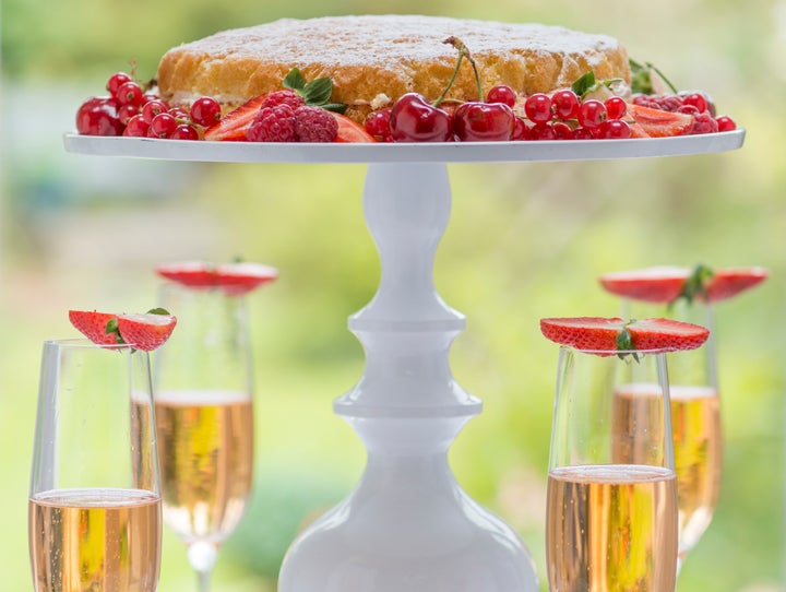 Victoria sponge cake on a cake stand.