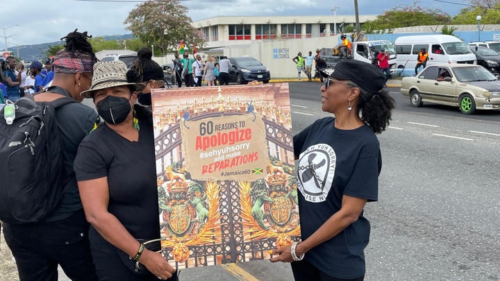 The Advocates Network's "60 Reasons to Apologize, #sehyuhsorry and make reparations" sign.